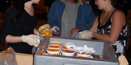 photo of volunteers distributing soup