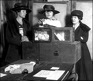 Three suffragists casting votes in New York City, 1917.