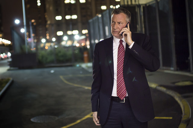de blasio on phone we don't know with who