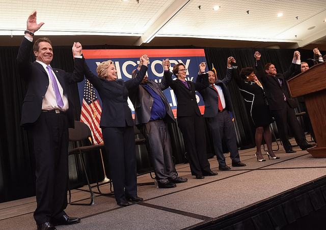 cuomo clinton et al celebrate