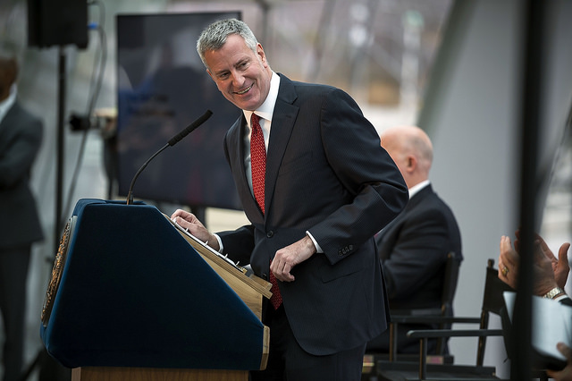 de Blasio press conference smile