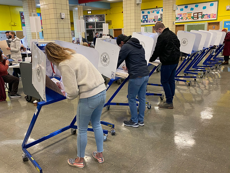 NYC voters voting booth