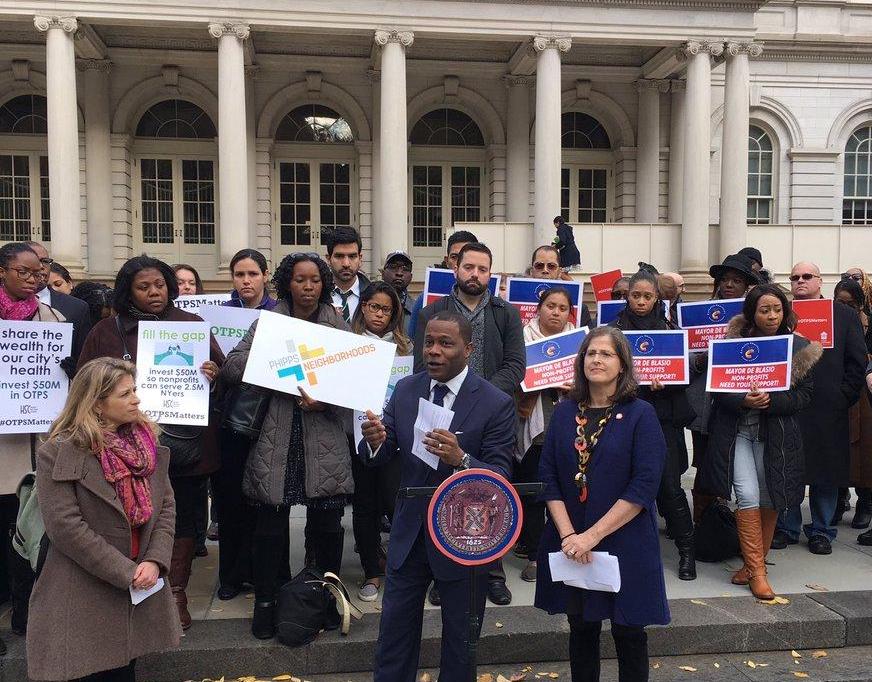 Urban Pathways rally outside city hall