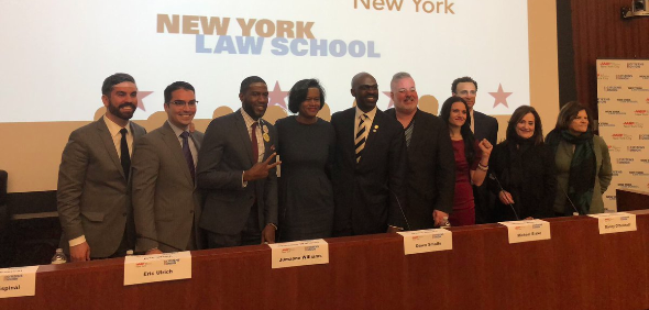 The candidates, moderator and hosts