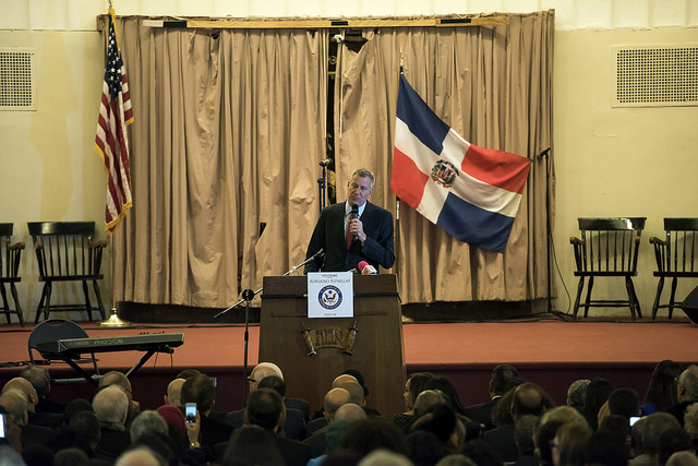 De Blasio speaking podium uptown